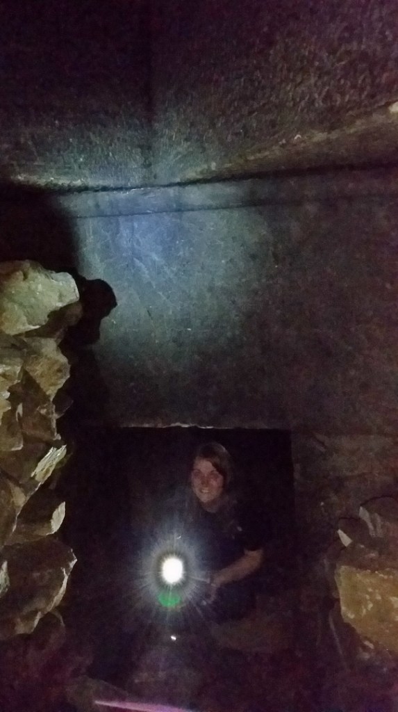 Stacey entering the first burial chamber; note the "crown molding" and offset ceiling (photo © Daniel C Browning Jr)